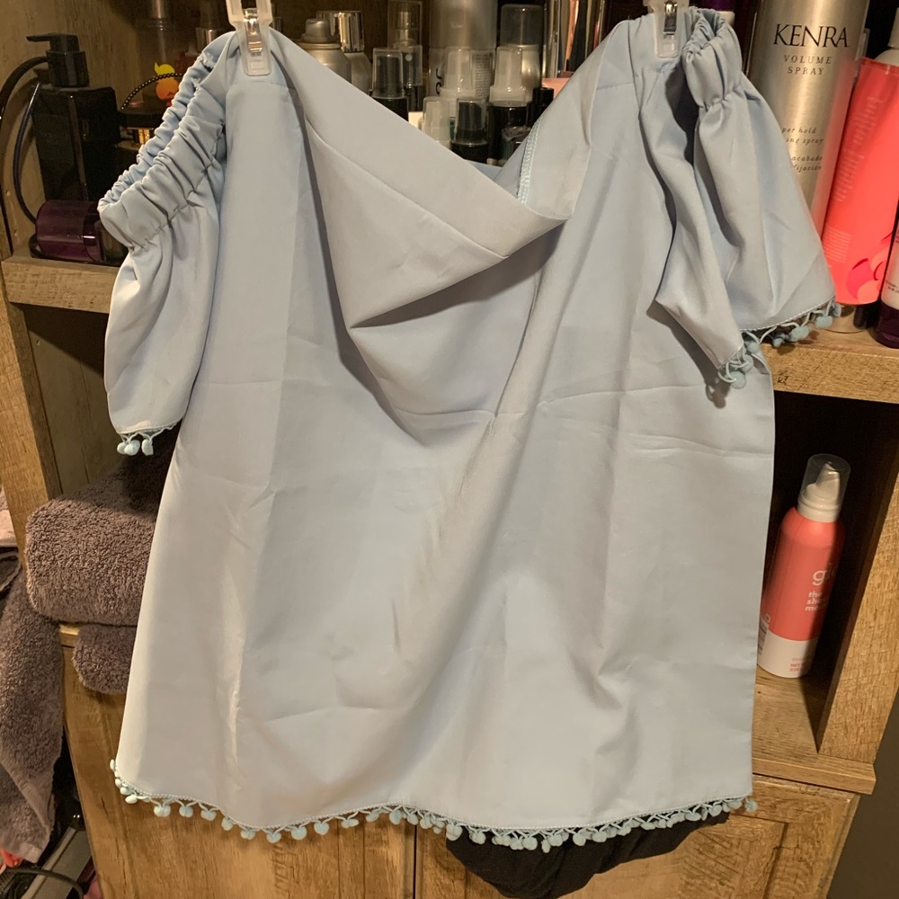 Never worn off shoulder shirt
